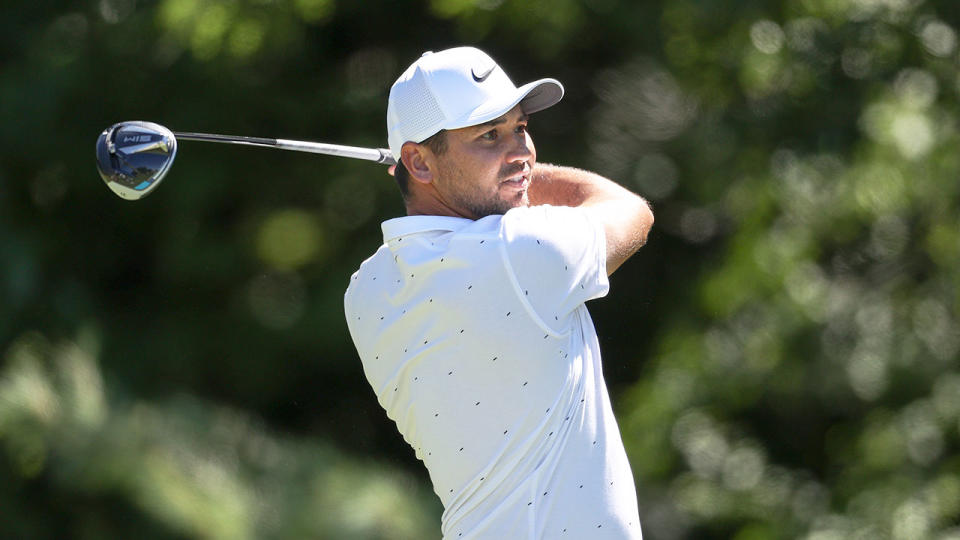 Jason Day is seen here watching a tee shot during a competitive round.