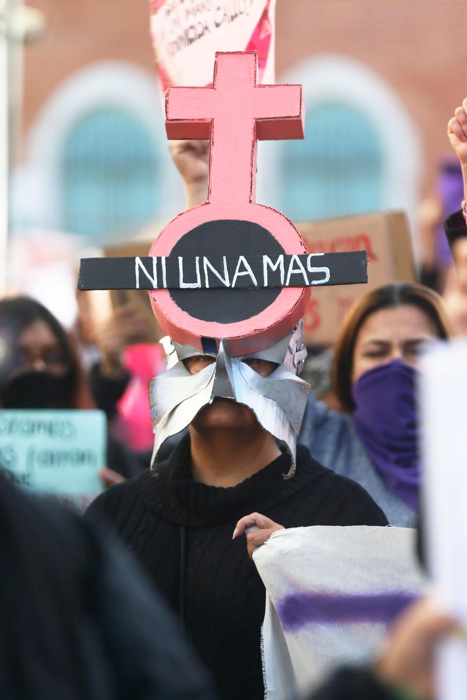 Protesters gather in front of the Museum of the Revolution in Juarez in a march on Jan. 25, 2020, demanding justice for the murder Juarez artist and activist Isabel Cabanillas.