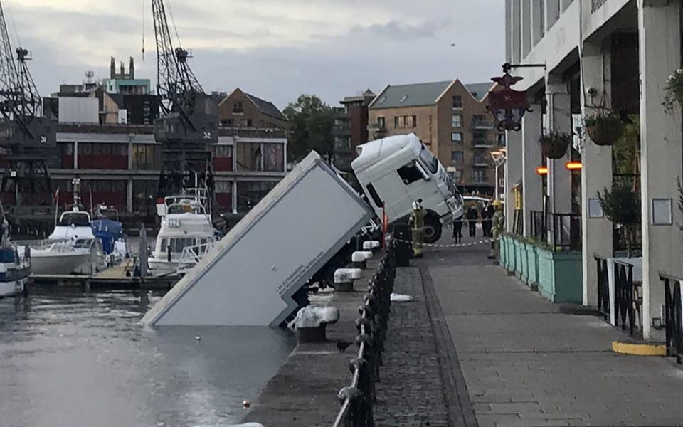 No-one was injured but nearby boats have been evacuated and cordons are in place near to the truck. - SWNS