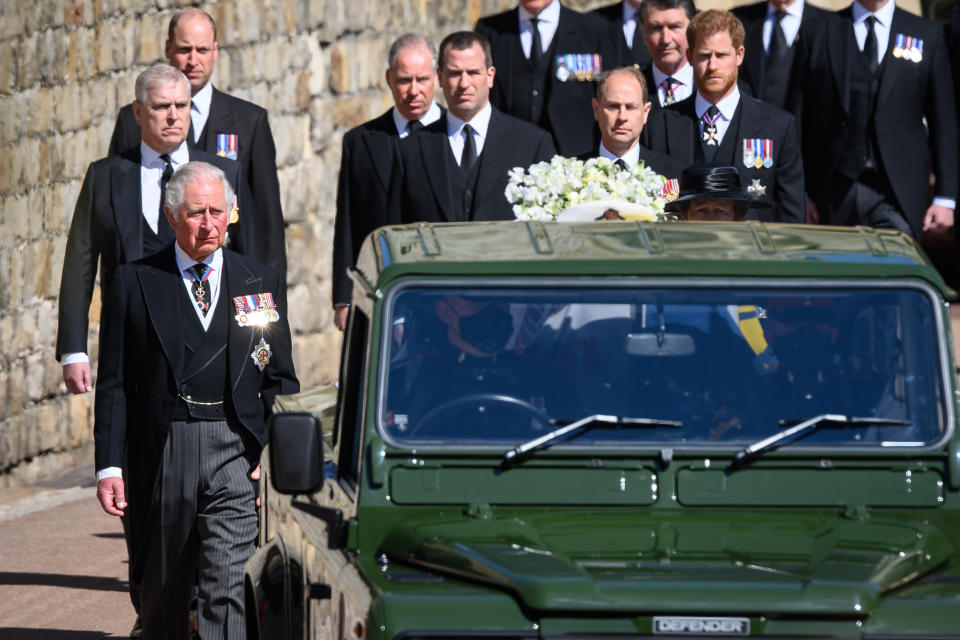 The Prince of Wales, the Princess Royal, the Duke of York, the Earl of Wessex, the Duke of Cambridge, the Duke of Sussex and Peter Phillips walking behind the Land Rover Defender carrying the coffin of the Duke of Edinburgh during his funeral at Windsor Castle in April 2021. (PA)