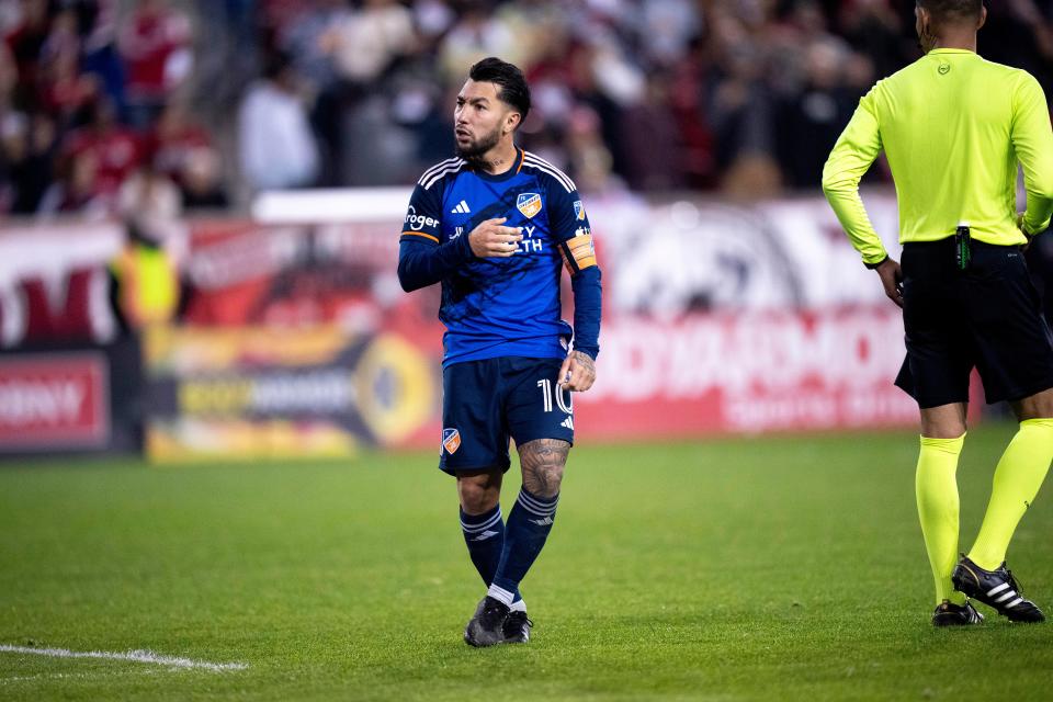 FC Cincinnati midfielder Luciano Acosta (10) gestures after hitting a penalty kick in the MLS playoff match between the New York Red Bulls and FC Cincinnati at Red Bull Arena in Harrison, N.J., on Saturday, Nov. 4, 2023.