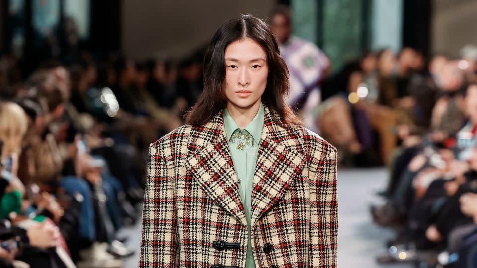 Equally at Rabanne, tartan blazers were given a grungier edge with leather-trimmed sleeves and fasteners. - Ik Aldama/dpa/AP