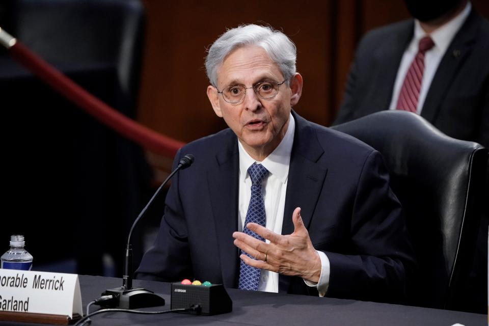 Judge Merrick Garland, President Joe Biden's pick to be attorney general, answers questions from Sen. John Kennedy, R-La., as he appears before the Senate Judiciary Committee for his confirmation hearing, on Capitol Hill in Washington on Feb. 22, 2021.