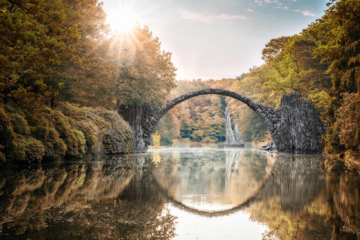 arch bridge rakotzbrucke at autumn