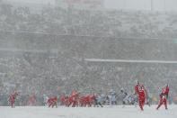 <p>The Buffalo Bills run an offensive play in a snow storm against the Indianapolis Colts during the first quarter at New Era Field. Mandatory Credit: Rich Barnes-USA TODAY Sports </p>