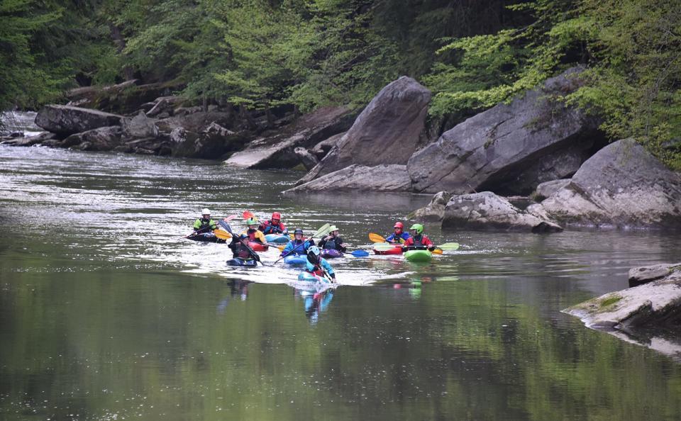 Enjoy whitewater kayaking in a group on Slippery Rock Creek in McConnells Mill State Park.