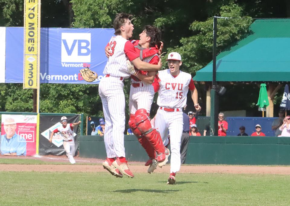 Redhawk pitcher Stephen Rickert and catcher Calvin Steele celebrate after the final out of CVU's 6-0 win over Mount Anthony in the D1 State Championship game on Saturday afternoon at Centennial Field.