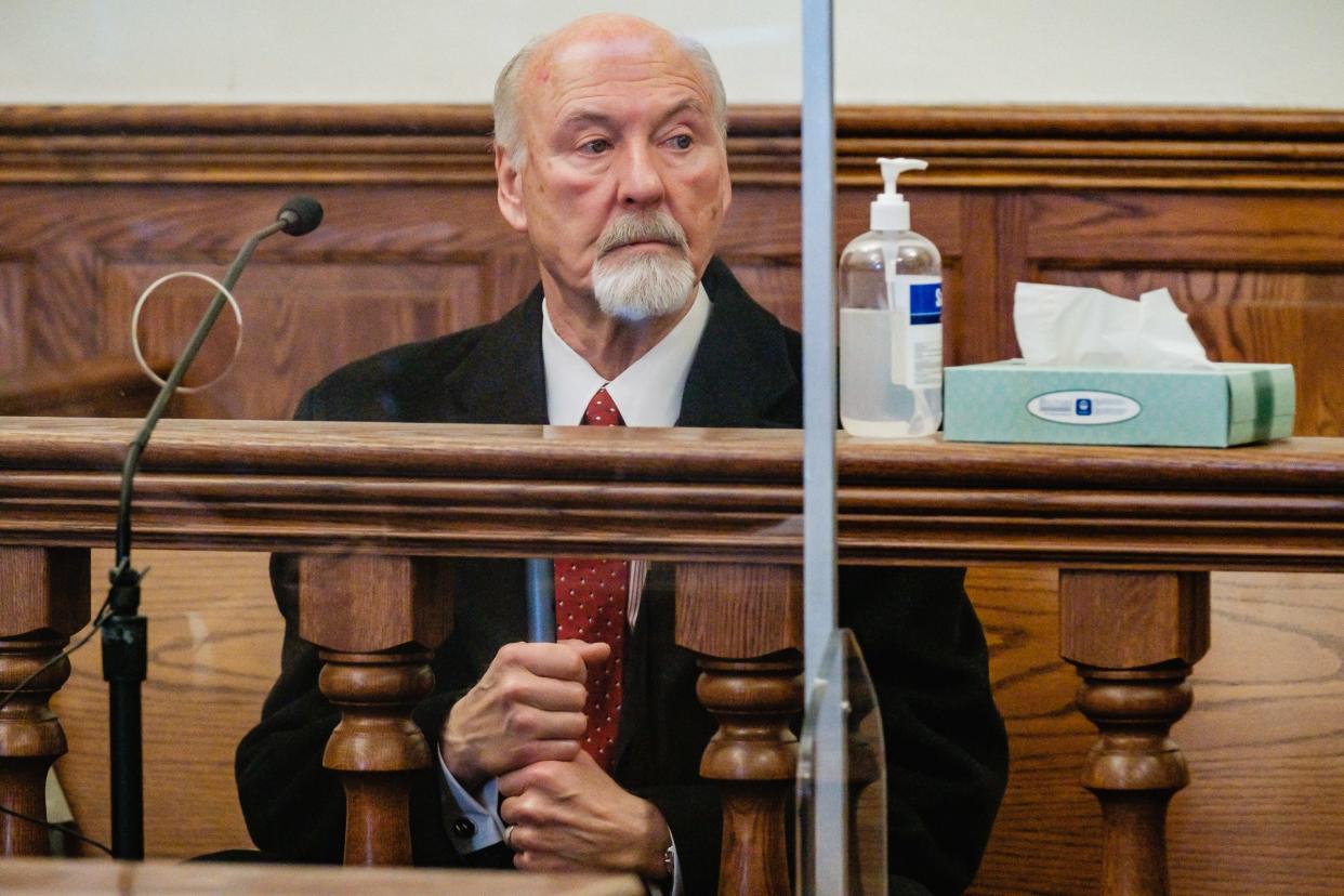 Now-suspended Dover Mayor Richard Homrighausen sits in the courtroom of Tuscarawas County Common Pleas Judge Elizabeth Lehigh Thomakos for his arraignment on 15 counts related to theft in office and other charges on March  30.