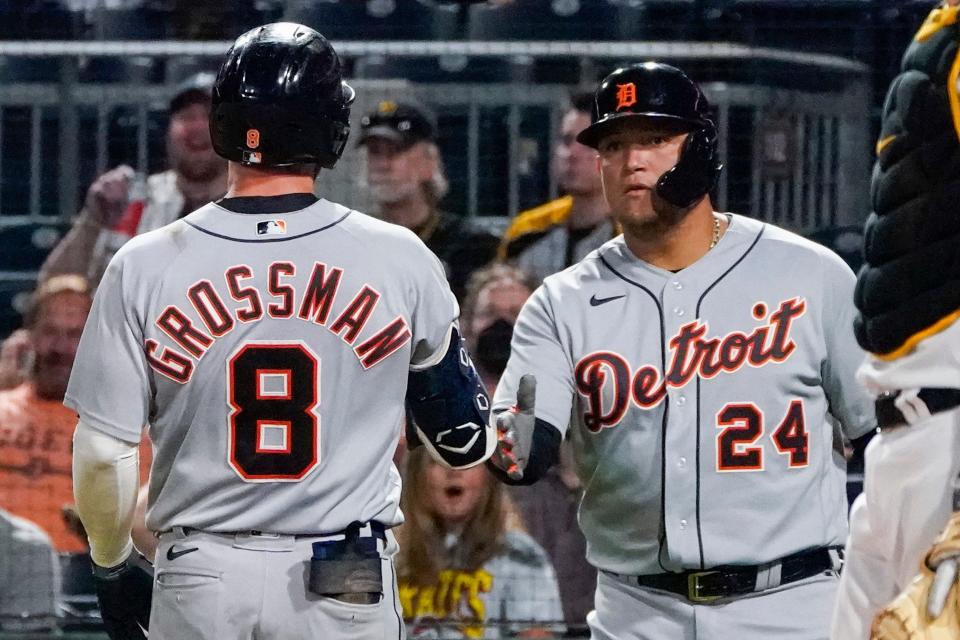 Detroit Tigers' Robbie Grossman (8) is greeted by Miguel Cabrera (24) after hitting a solo home run off Pittsburgh Pirates relief pitcher Cody Ponce during the seventh inning at PNC Park in Pittsburgh on Wednesday, Sept. 8, 2021.