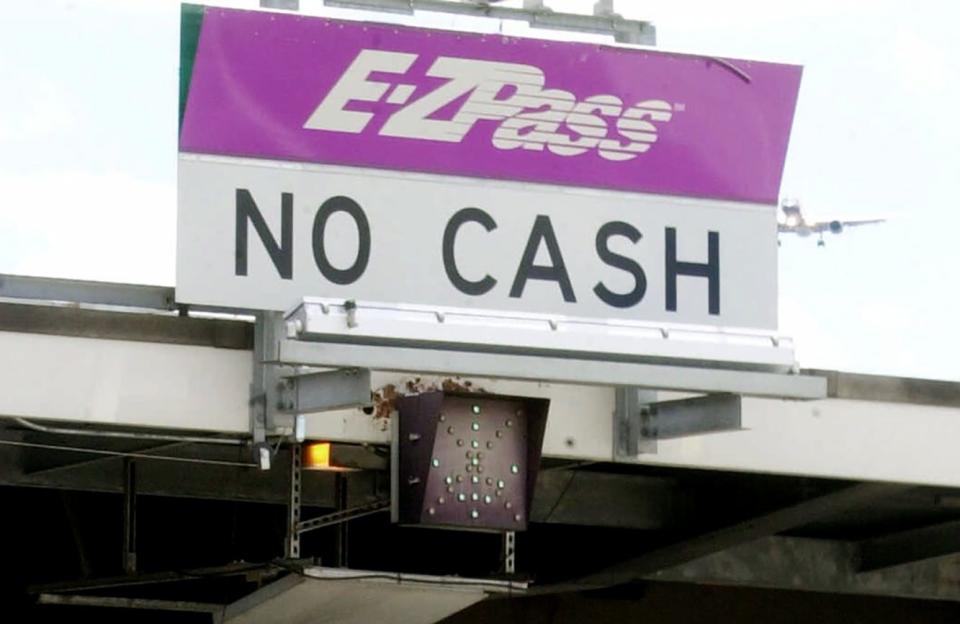 A truck rumbles through one of the E-ZPass lanes at Interchange 13A of the New Jersey Turnpike in Elizabeth, N.J., Friday, July 6, 2001. Starting July 15, drivers who exceed the 5-mph speed limit for E-ZPass lanes on the Garden State Parkway, New Jersey Turnpike and Atlantic City Expressway will receive warnings for their first two offenses. Further violations could result in temporary suspensions or revocation of E-ZPass privileges under a plan announced Thursday by state highway officials.