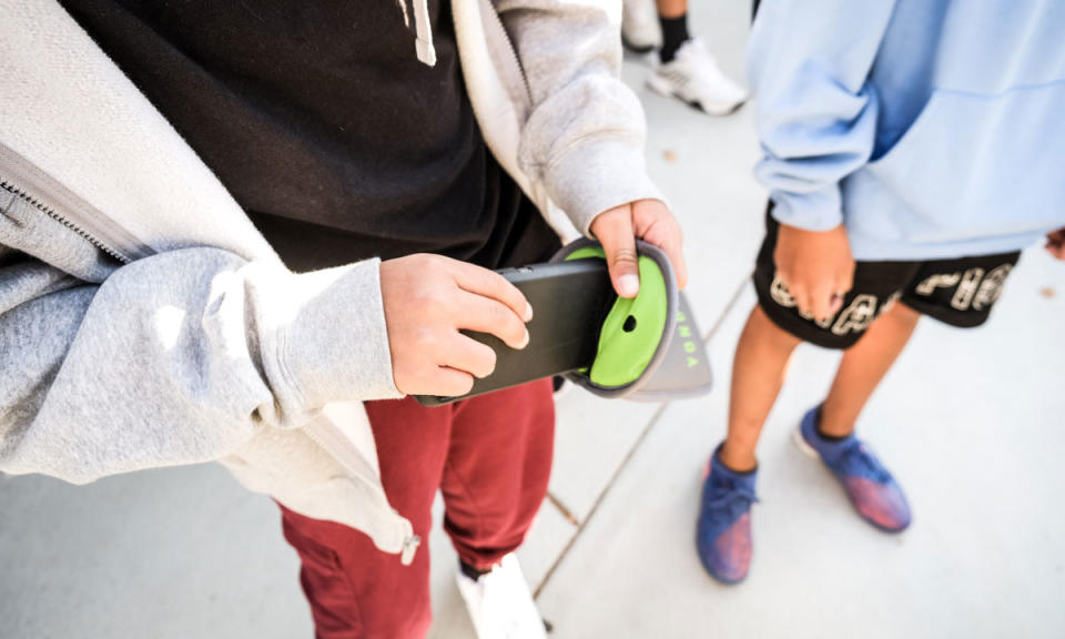 More U.S. students may have to store their phones during the school day if Congress passes a bill to study and award grants for phone-free schools. (Yondr)