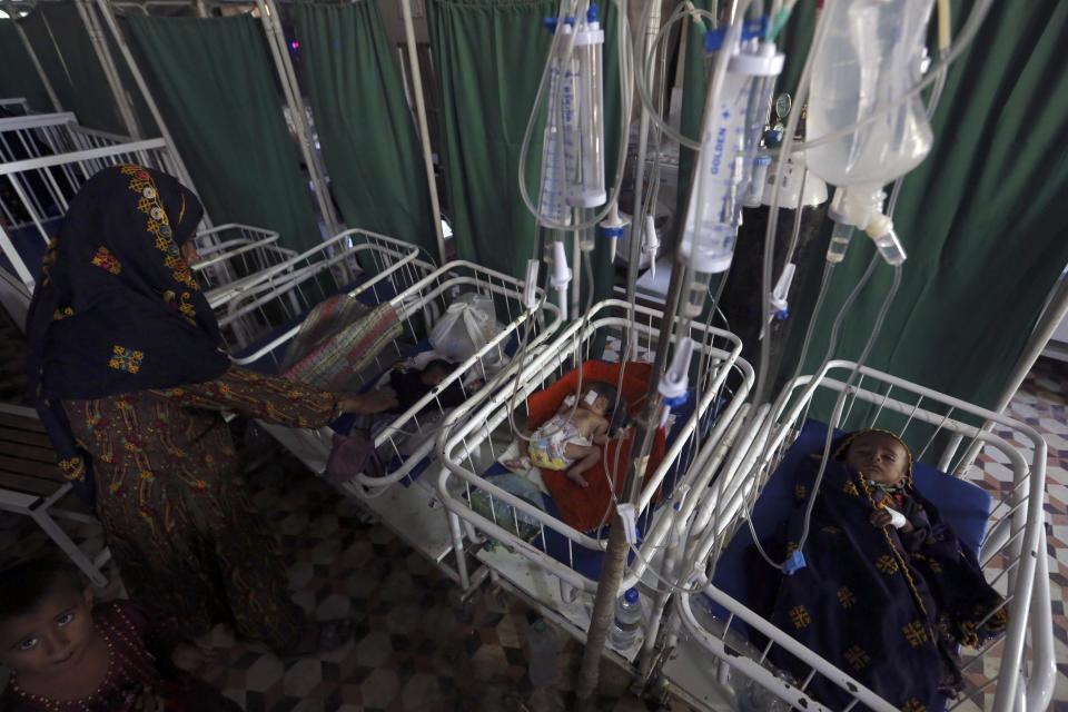 Newborn babies lie in their beds at the hospital after their flood-hit homes in Shikarpur district of Sindh Province, of Pakistan, Thursday, Sep. 1, 2022. Pakistani health officials on Thursday reported an outbreak of waterborne diseases in areas hit by recent record-breaking flooding, as authorities stepped up efforts to ensure the provision of clean drinking water to hundreds of thousands of people who lost their homes in the disaster. (AP Photo/Fareed Khan)