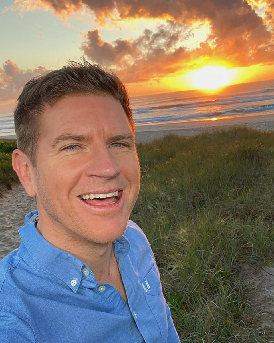 Sam Mac takes selfie with sunrise