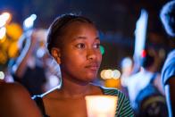 <p>A woman holds a candle during a demonstration on the eve of the commemoration of the International Day for the Elimination of Violence Against Women, in Santo Domingo on Nov. 24, 2017. (Photo: Erika Santelices/AFP/Getty Images) </p>