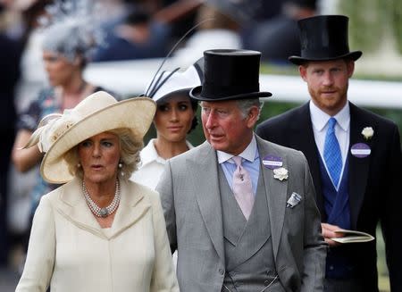 Horse Racing - Royal Ascot - Ascot Racecourse, Ascot, Britain - June 19, 2018 Charles, Prince of Wales, Camilla, Duchess of Cornwall, Britain's Prince Harry and Meghan, the Duchess of Sussex arrive at Ascot racecourse REUTERS/Peter Nicholls