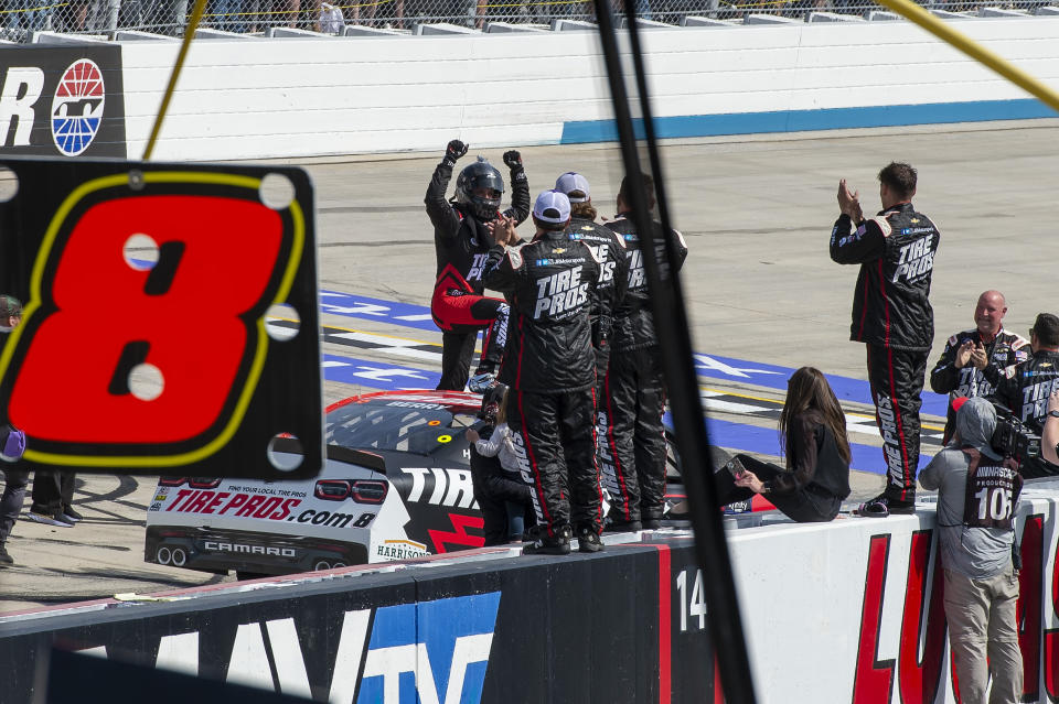 Josh Berry (8) celebrates with his team after winning at the NASCAR Xfinity Series auto race at Dover International Speedway, Saturday, April 30, 2022, in Dover, Del. (AP Photo/Jason Minto)