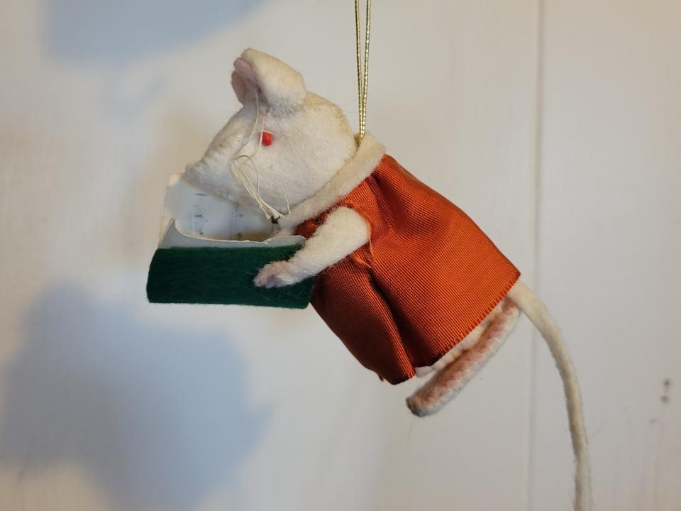 Handmade Cathedral Mice raising money for the preservation of St. Paul's Cathedral date back to 1961. This one from 1962 has lost its spectacles over the years.