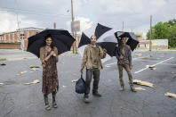 <p>Probably not, but even the undead — or those who play them on TV — need some protection from that summer Atlanta heat on <em>The Walking Dead</em> set. (Photo: AMC) </p>