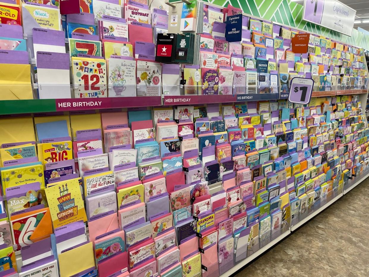 An aisle of greeting cards for $1.