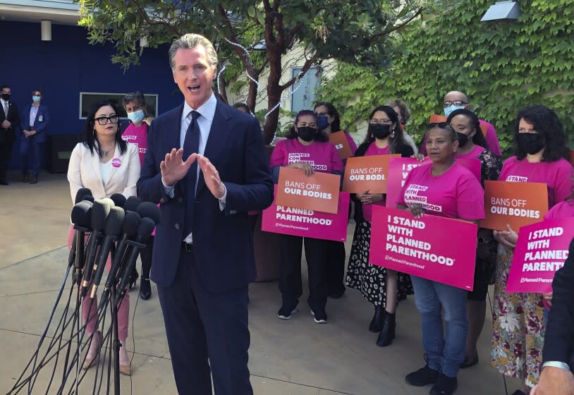 California Gov. Gavin Newsom talks at a news conference with workers and volunteers on Wednesday, May 4, 2022, at a Planned Parenthood office near downtown Los Angeles. Newsom faulted his own political party Wednesday for setbacks in the nation's culture wars and urged Democrats to launch a vocal "counter-offensive" to protect rights from abortion to same-sex marriage. (AP Photo/Michael R. Blood)