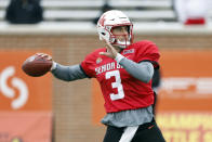 American quarterback Clayton Tune of Houston throws a pass during practice for the Senior Bowl NCAA college football game, Thursday, Feb. 2, 2023, in Mobile, Ala.. (AP Photo/Butch Dill)