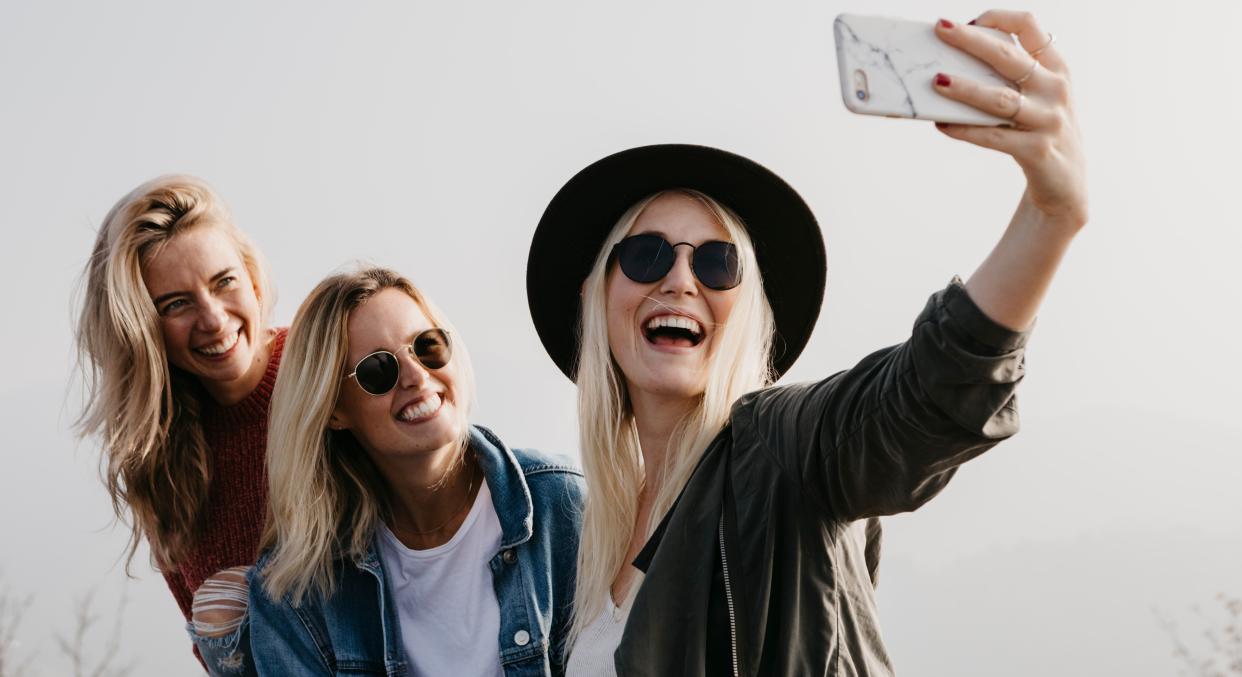 The trend for selfies is fuelling a rise in sore wrist complaints, according to a doctor [Image: Getty]