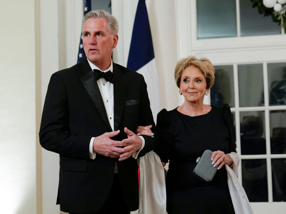 House Minority Leader Kevin McCarthy of Calif., and his mother Roberta McCarthy arrive for the State Dinner with President Joe Biden and French President Emmanuel Macron at the White House in Washington, Thursday, Dec. 1, 2022.