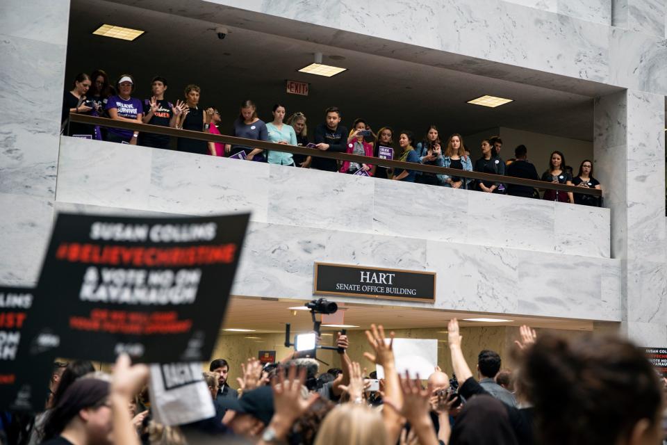 Protesters speak out as Kavanaugh hearing begins