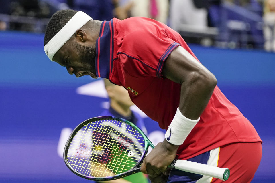 Frances Tiafoe, of the United States, reacts after winning the fourth game of the fourth set against Andrey Rublev, of Russia, at the third round of the US Open tennis championships, Saturday, Sept. 4, 2021, in New York. (AP Photo/Frank Franklin II)