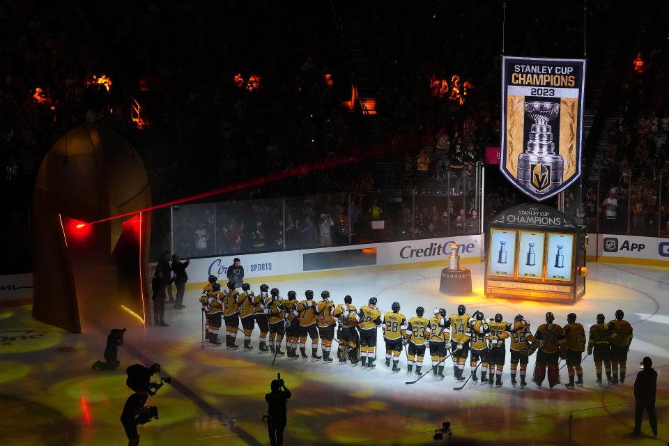 The Vegas Golden Knights raise the 2023 Stanley Cup Champions banner before the start of a game against the Seattle Kraken at T-Mobile Arena. Mandatory Credit: Stephen R. Sylvanie-USA TODAY Sports