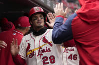 St. Louis Cardinals' Nolan Arenado celebrates after scoring during the third inning of a baseball game against the Toronto Blue Jays Saturday, April 1, 2023, in St. Louis. (AP Photo/Jeff Roberson)