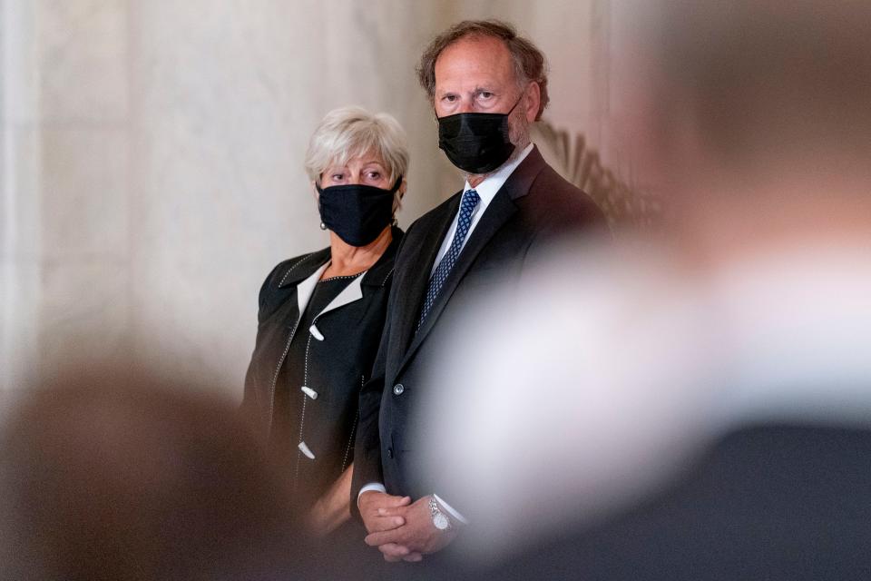 Justice Samuel Alito and his wife Martha-Ann stand during a private ceremony for Justice Ruth Bader Ginsburg at the Supreme Court in Washington, Wednesday, Sept. 23, 2020.