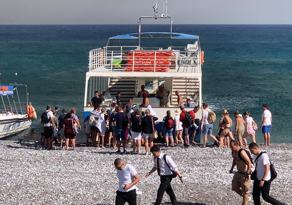 At least 30 private vessels were involved in rescuing tourists from two designated beach evacuation points (REUTERS)