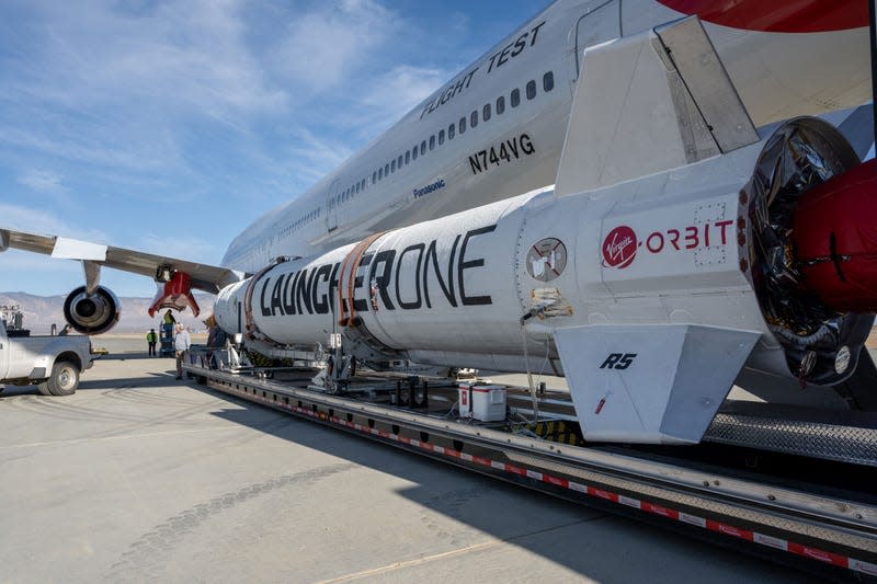 The LauncherOne rocket being prepared for launch.