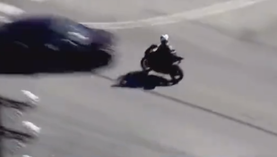 Pictured is the motorcyclist seconds before it collided with the car.