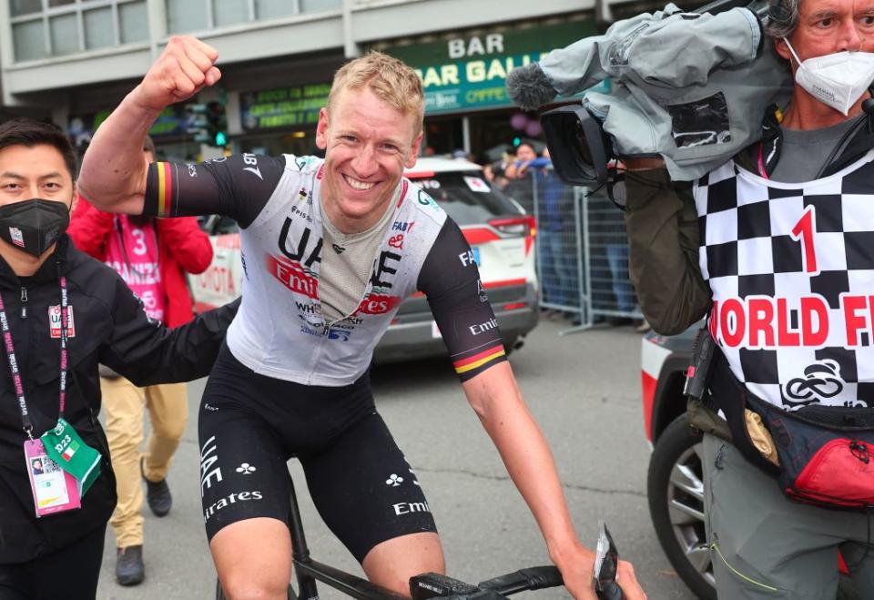 UAE Team Emiratess German rider Pascal Ackermann celebrates after he crossed the finish line to win the eleventh stage of the Giro dItalia 2023 cycling race 219 km between Camaiore and Tortona on May 17 2023 Photo by Luca Bettini  AFP Photo by LUCA BETTINIAFP via Getty Images
