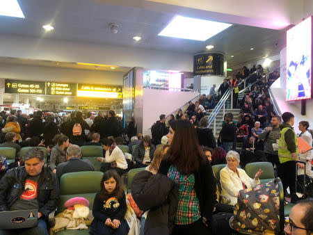 Stranded passengers wait at Gatwick Airport, Britain, December 20, 2018 in this picture obtained from social media. Ani Kochiashvili/via REUTERS