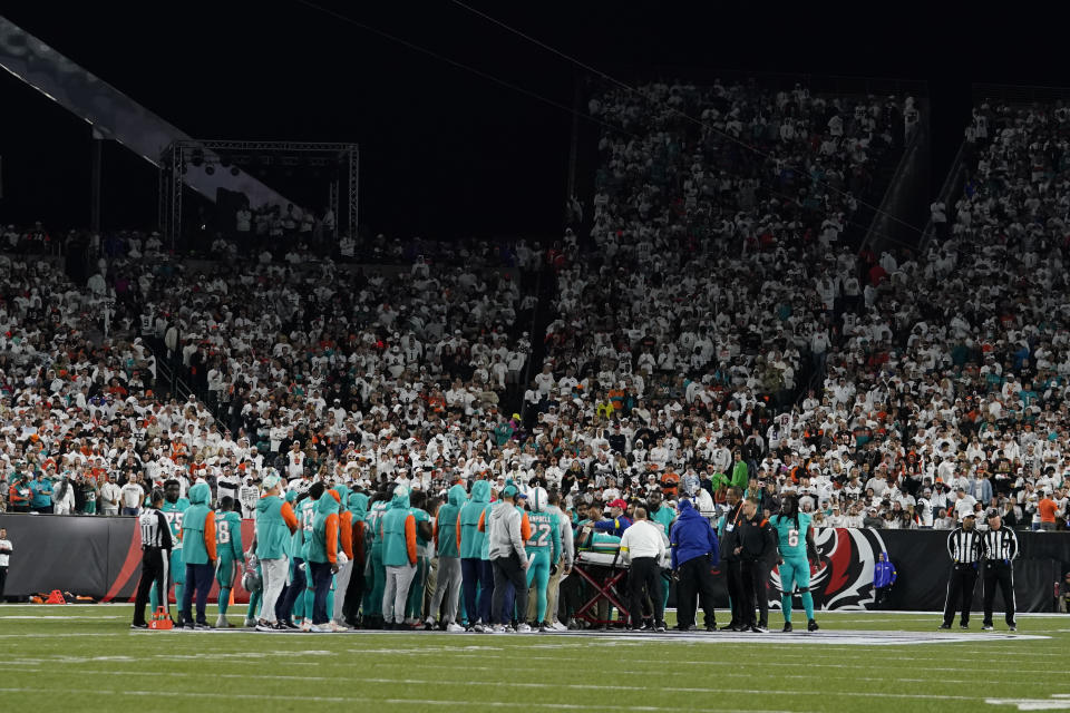 Miami Dolphins quarterback Tua Tagovailoa is taken off the field on a stretcher during the first half of an NFL football game against the Cincinnati Bengals, Thursday, Sept. 29, 2022, in Cincinnati. (AP Photo/Jeff Dean)