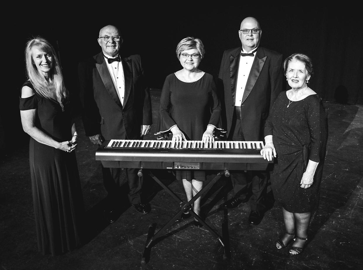The Spotlight Players  — from left, Kay Norton Daniel, Kent Back, Lana Cornutt, Wayne Cornutt and Linda Clayton Robertson — will mark their 40th anniversary as a group with two Christmas concerts Dec. 2 and 4 at the Ritz Theatre.