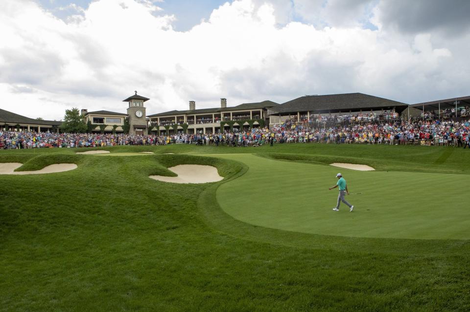 Collin Morikawa walks up to the 18th green during the final round of the Memorial Tournament at Muirfield Village Golf Club in Dublin, Ohio on Sunday, June 6, 2021. 