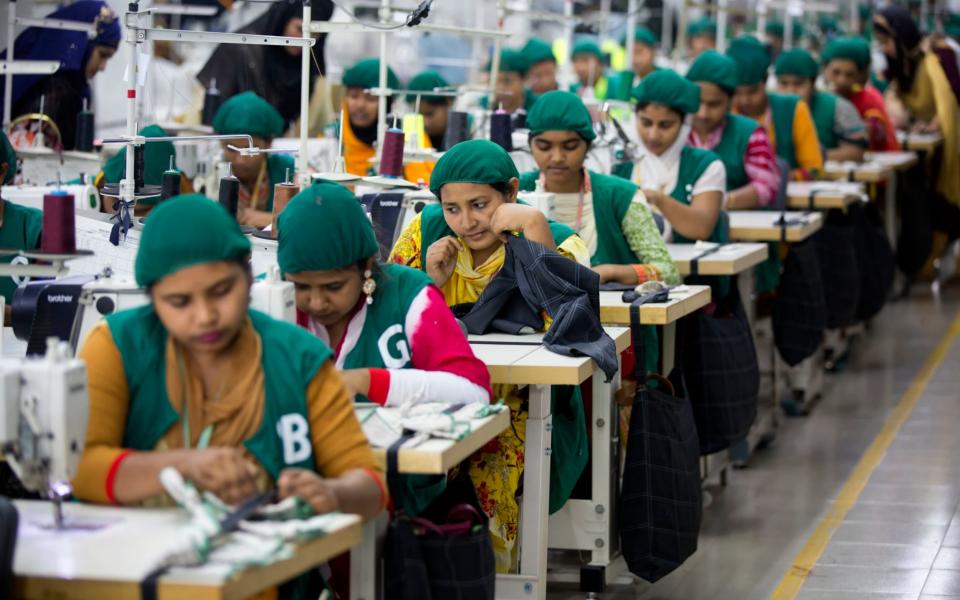 Garment workers in a factory in Bangladesh - AM Ahad/AP