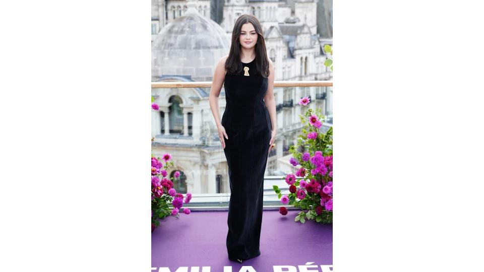 Selena Gomez attending the Emilia Perez cast photo call at the Corinthia Hotel, in London wearing a velvet black gown