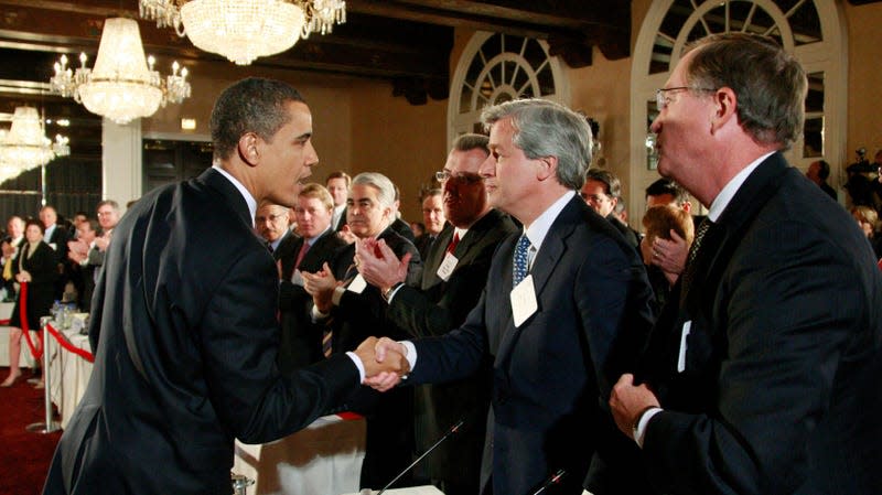 Barack Obama (left) and Jamie Dimon (center) shake hands at a Washington hotel in 2009