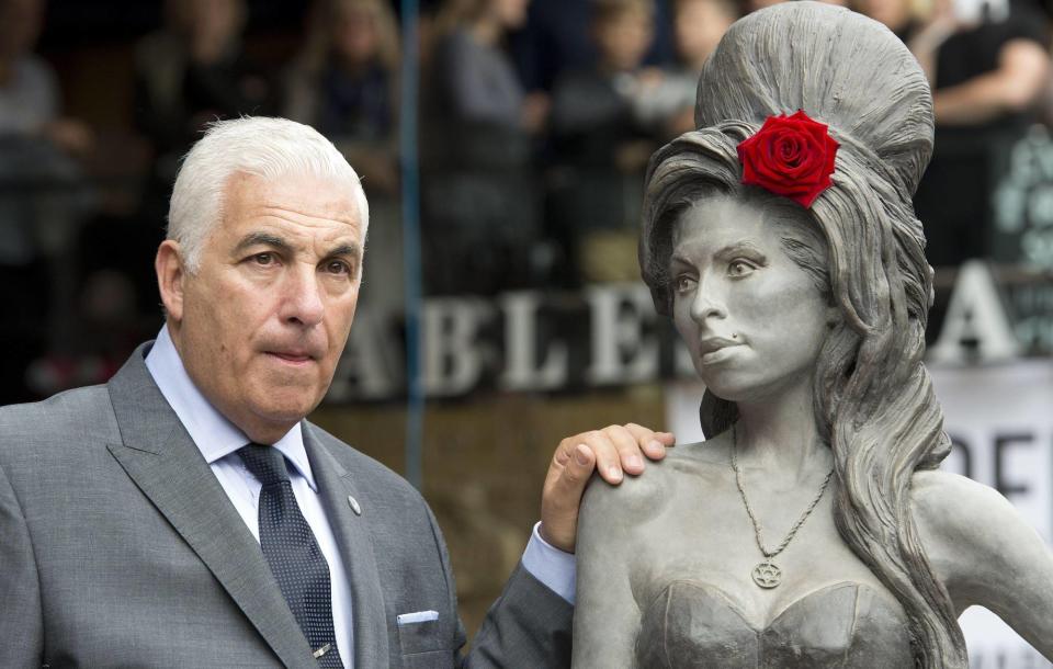 Mitch Winehouse and a statue of the late Amy Winehouse (Picture: Alamy)