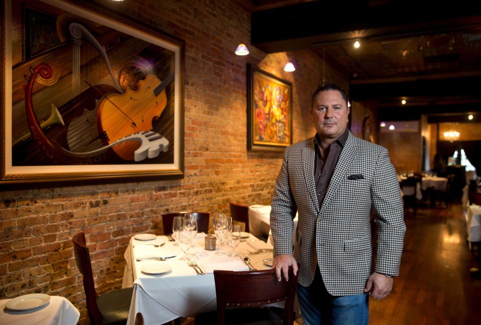 Restaurateur Steven Botta of Freehold Township, shown in 2016 in the dining room of his Brando's Citi Cucina in Asbury Park.