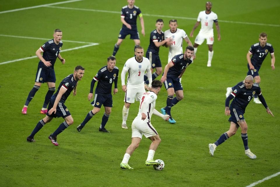 England's Jack Grealish controls the ball during the Euro 2020 soccer championship group D match between England and Scotland, at Wembley stadium, in London, Friday, June 18, 2021. The match ended 0-0. (AP Photo/Matt Dunham, Pool)