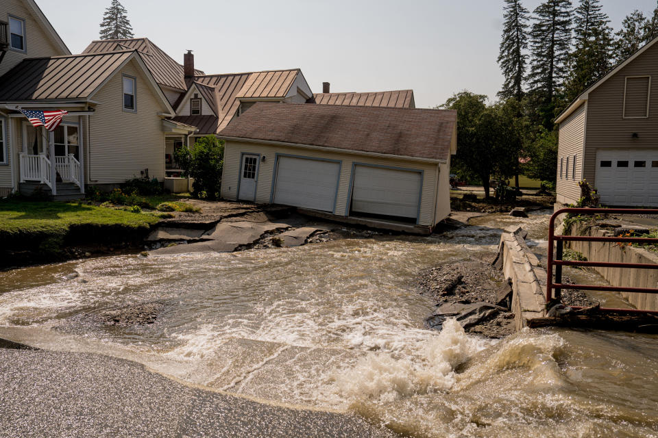 Homes in Barre, Vt., inundated with flash flooding on July 11, 2023. (John Tully / The Washington Post via Getty Images)
