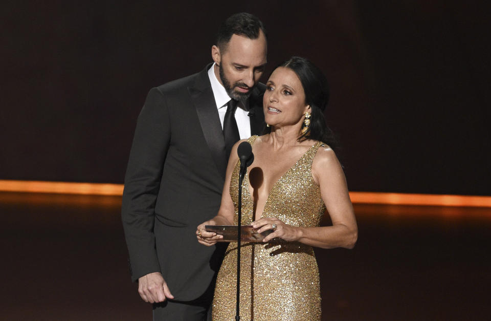 Tony Hale, left, and Julia Louis-Dreyfus present the award for outstanding lead actress in a limited series or movie at the 71st Primetime Emmy Awards on Sunday, Sept. 22, 2019, at the Microsoft Theater in Los Angeles. (Photo by Chris Pizzello/Invision/AP)