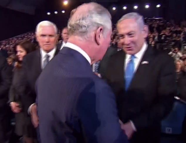 Prince Charles greets Benjamin Netanyahu Mike Pence touches his shoulder on left