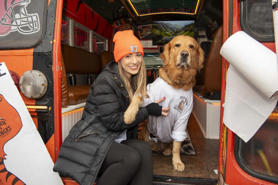 Rachel Butler and her dog Bean gave the Bengals the cutie-pie courage to beat the Browns on Jan. 7.